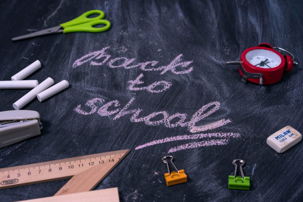 Blackboard with back to school boldly written on it.